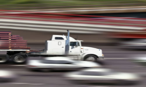 truck delivering steel building