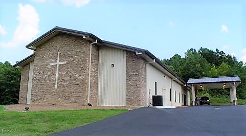 steel church building with cross