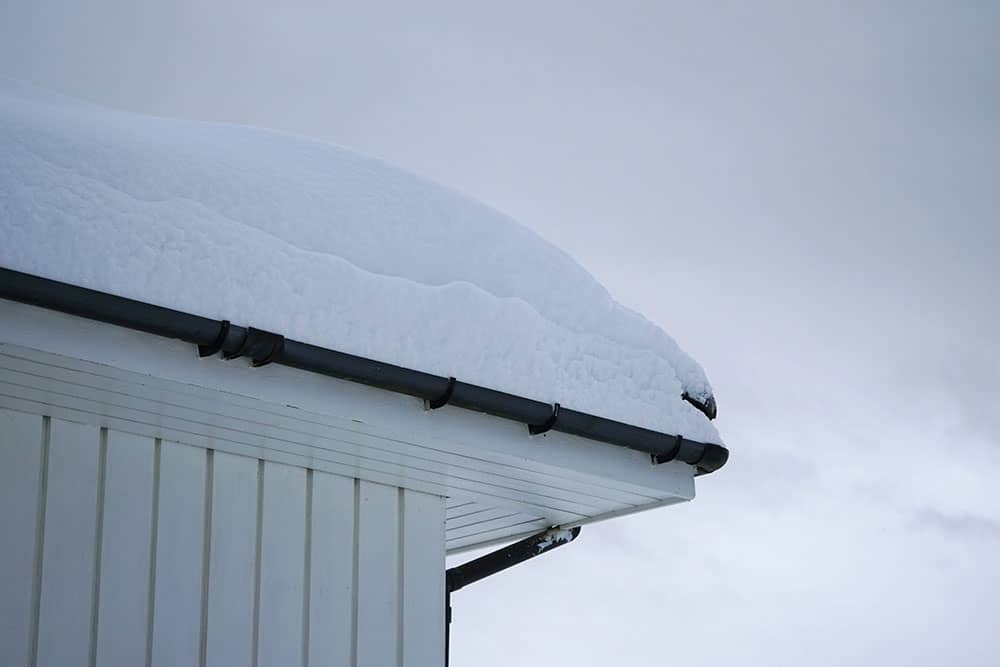 Snow on a steel building roof