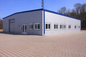FactorySteelOverstock metal building with blue trim FactorySteelOverstock metal building with blue trim