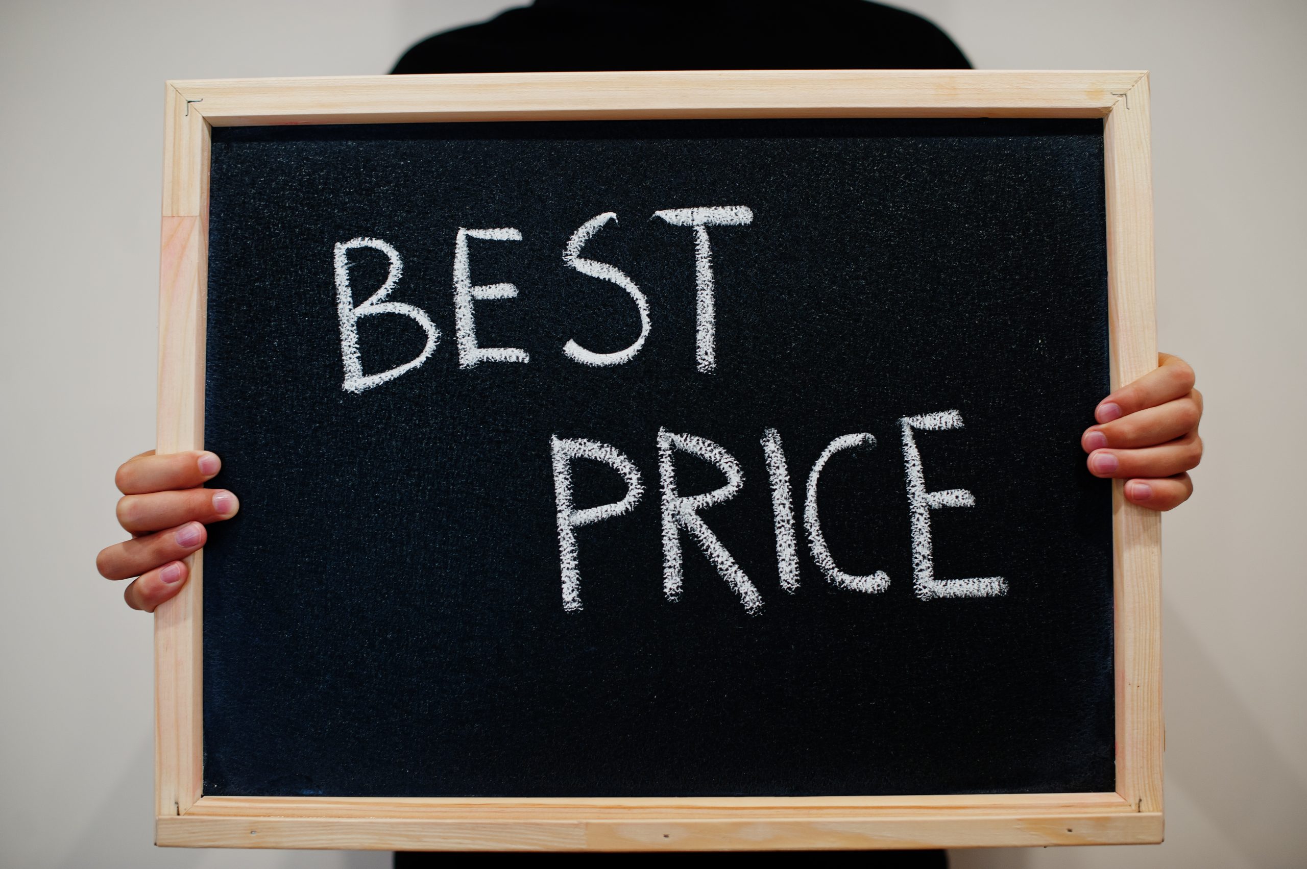 best price written on blackboard scaled